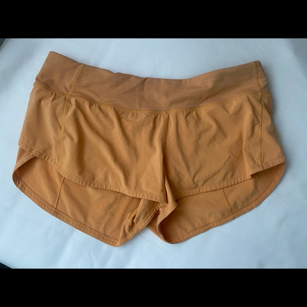 Orange lululemon shorts